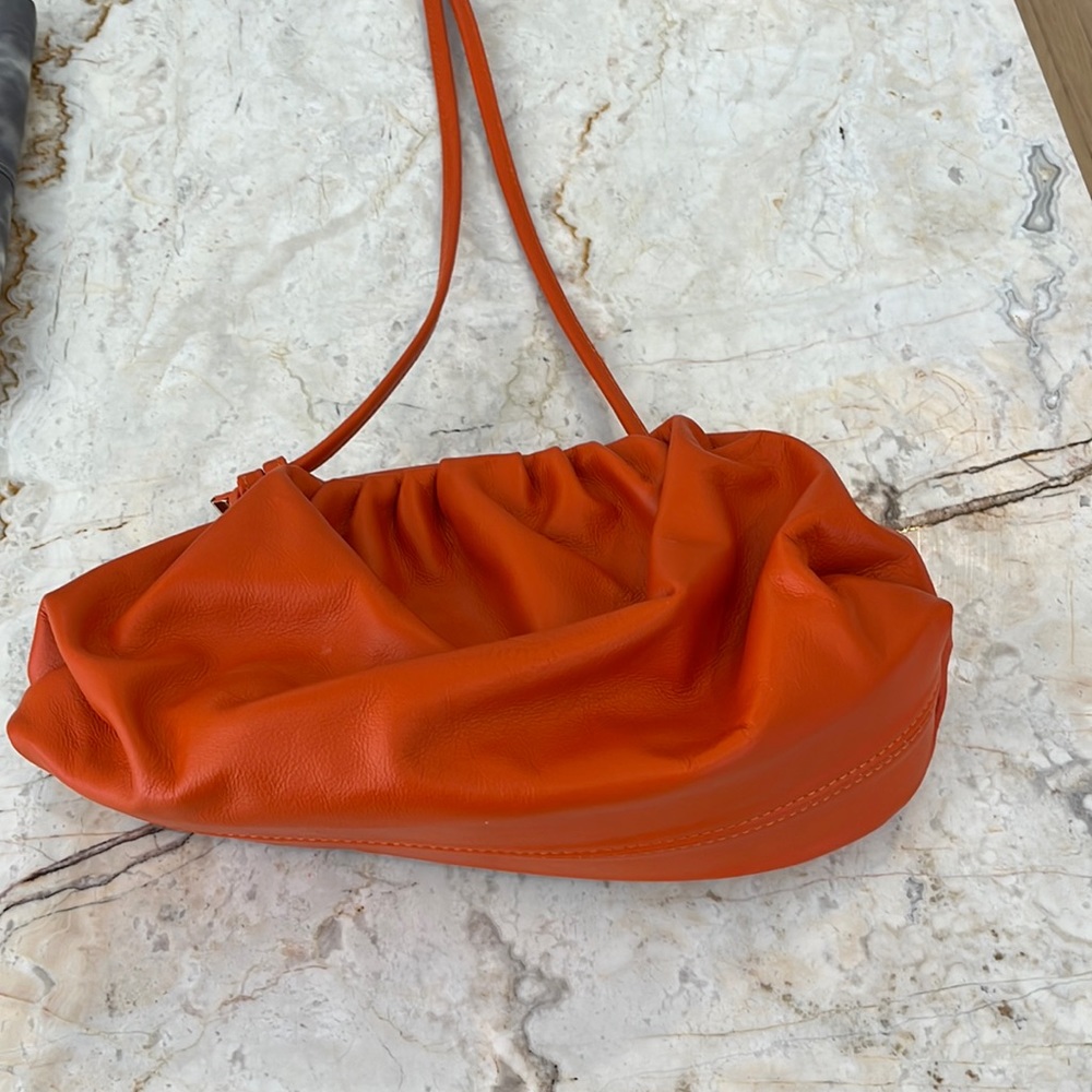 Orange cloud bag never been used